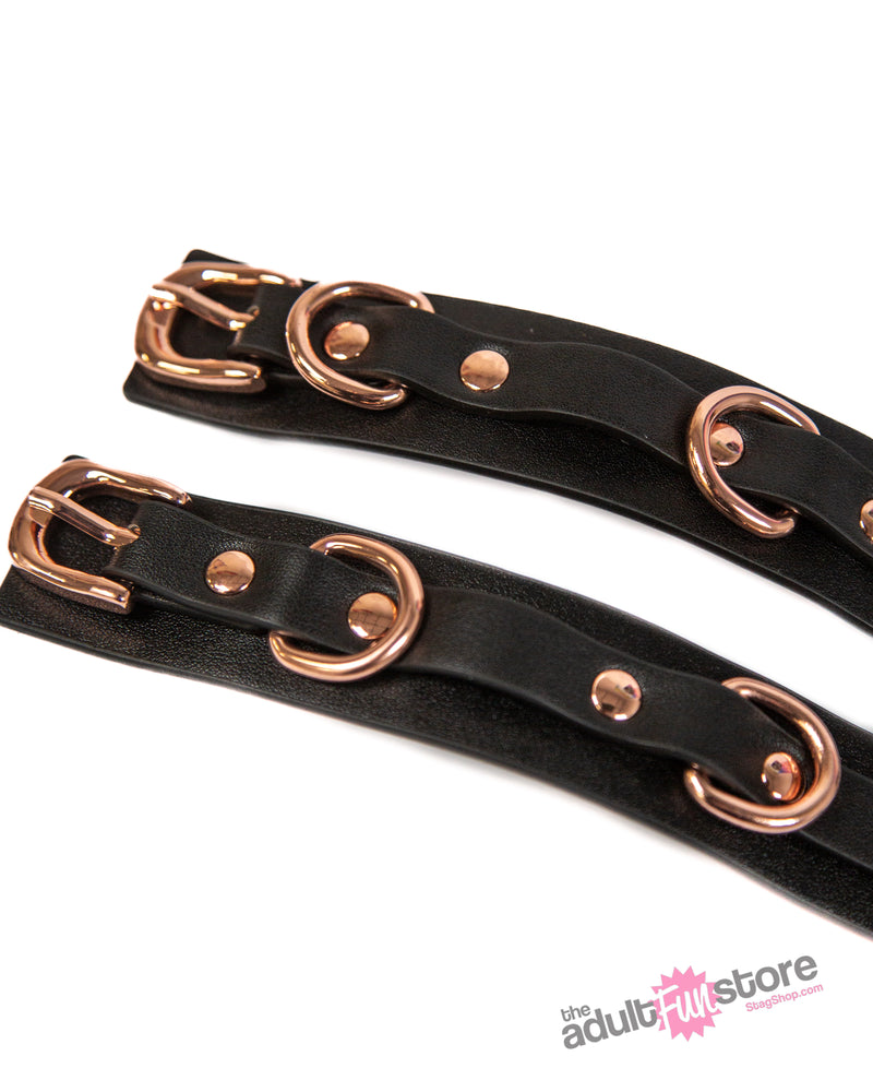 NS Novelties - Bondage Couture - Wrist Cuffs - Black/Rose Gold - Stag Shop