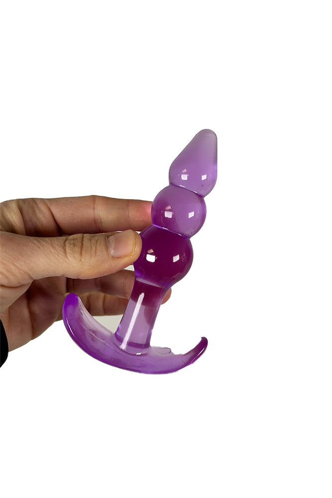 NS Novelties - Jelly Rancher - T-Plug - Ripple - Assorted Colors | Stag Shop NS Novelties - Jelly Rancher - T-Plug - Ripple - Assorted Colors | Stag Shop