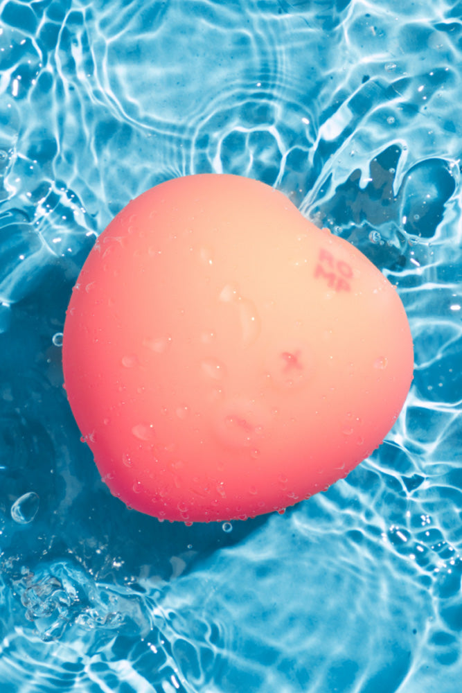 Romp - Pink Peach Air Pulse Clitoral Stimulator - Stag Shop