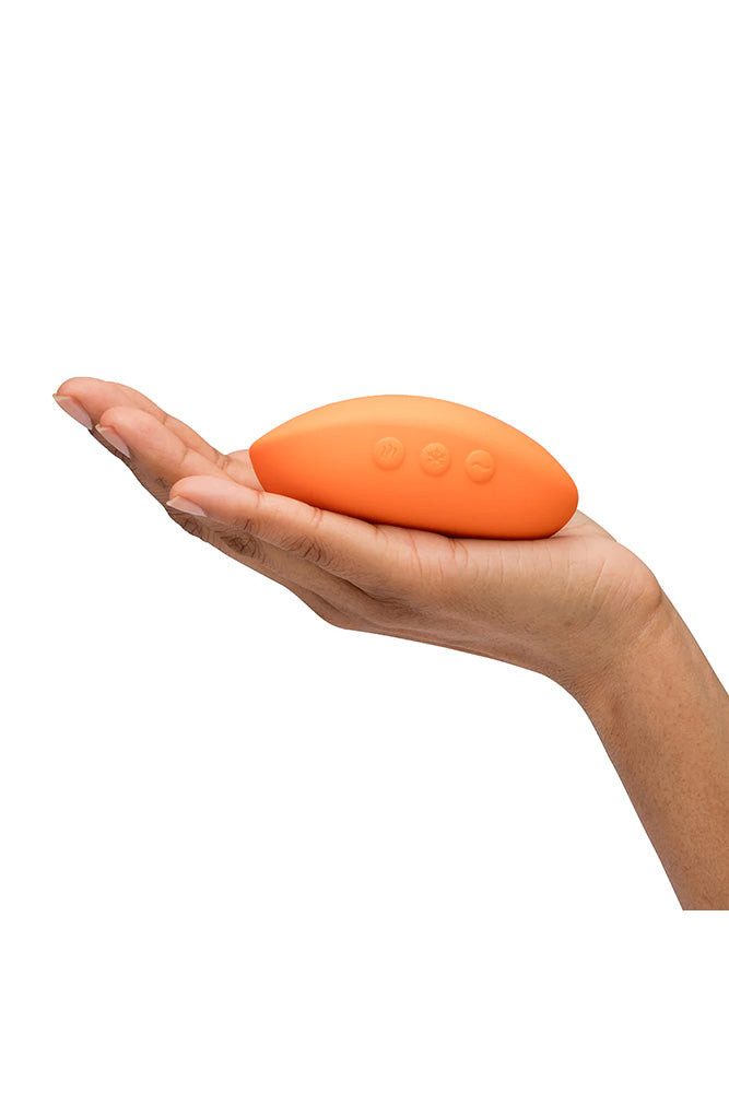 We-Vibe - Temp Heating & Cooling Lay-On Vibrator - Tangerine - Stag Shop