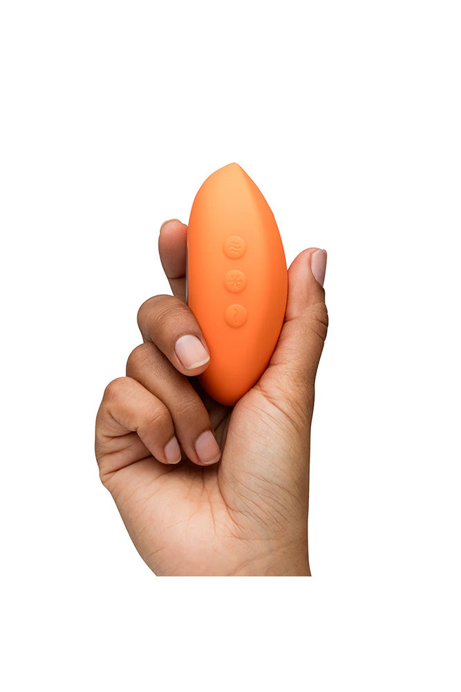 We-Vibe - Temp Heating & Cooling Lay-On Vibrator - Tangerine - Stag Shop