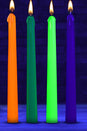 XR Brands - Master Series - Glow Wax Set Of 4 UV Blacklight Reactive Candles - Stag Shop