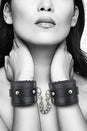 Ouch by Shots Toys - Black & White - Plush Adjustable Bonded Leather Wrist Cuffs - Black - Stag Shop