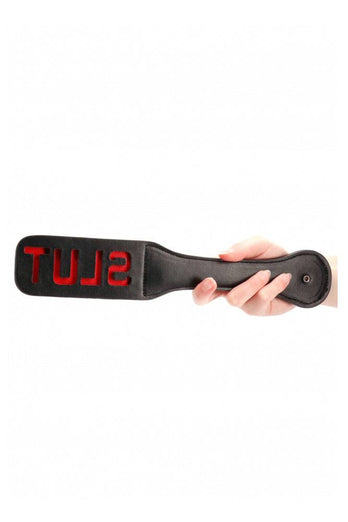 Ouch by Shots Toys - SLUT Paddle - Black/Red - Stag Shop
