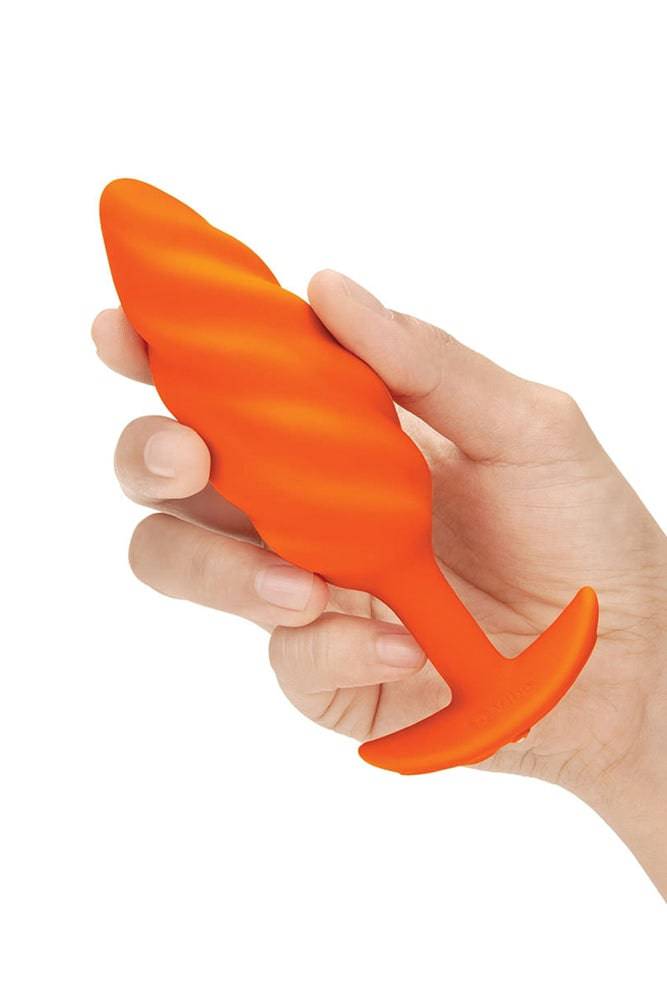 b-Vibe - Swirl Textured Vibrating Butt Plug - Orange - Stag Shop